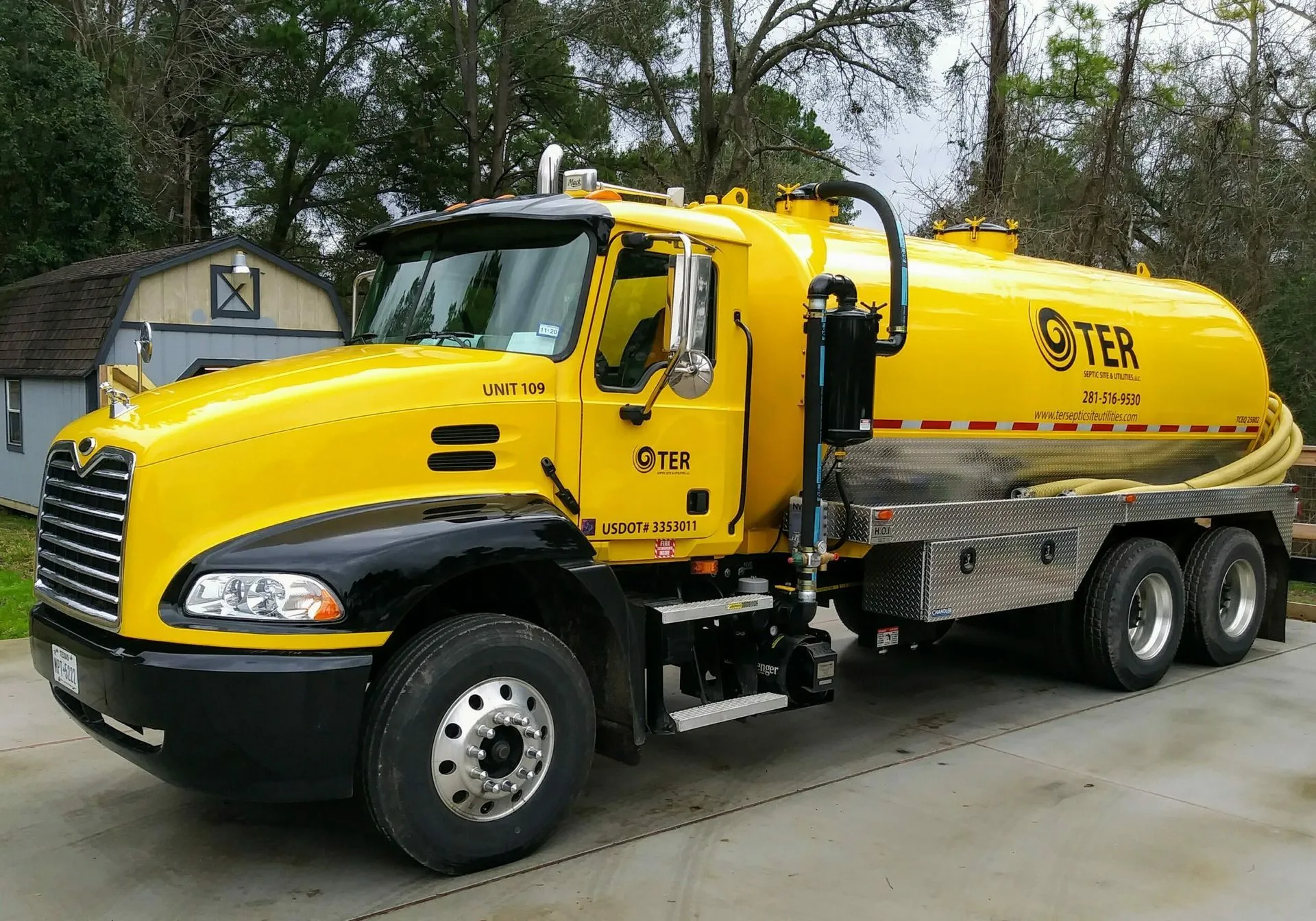 Yellow T.E.R. Septic pump truck parked and ready for a service call in Tomball, TX